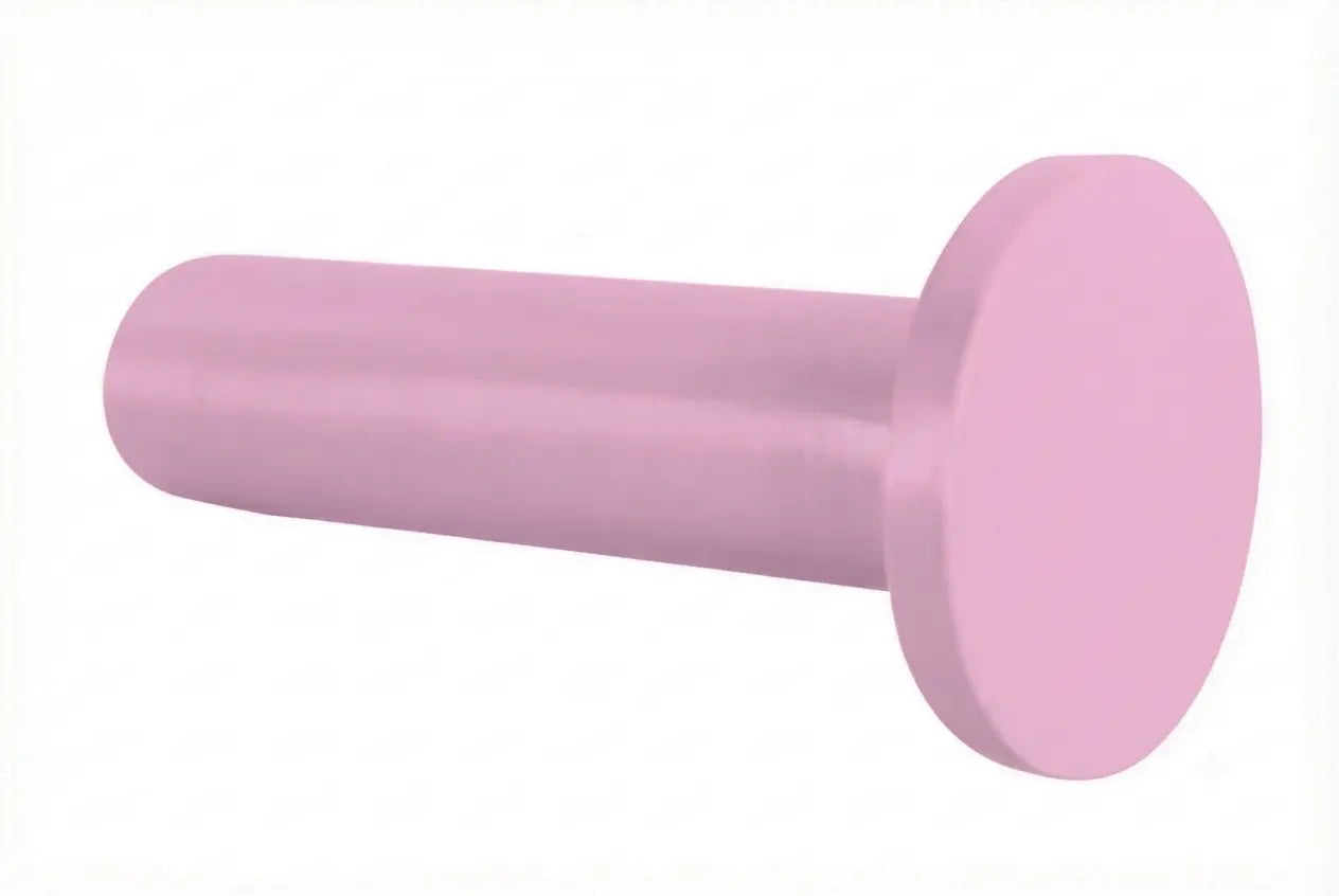 Moderner kleiner Wandhaken mit kreisförmiger Scheibe in der Farbe Hellrosa.